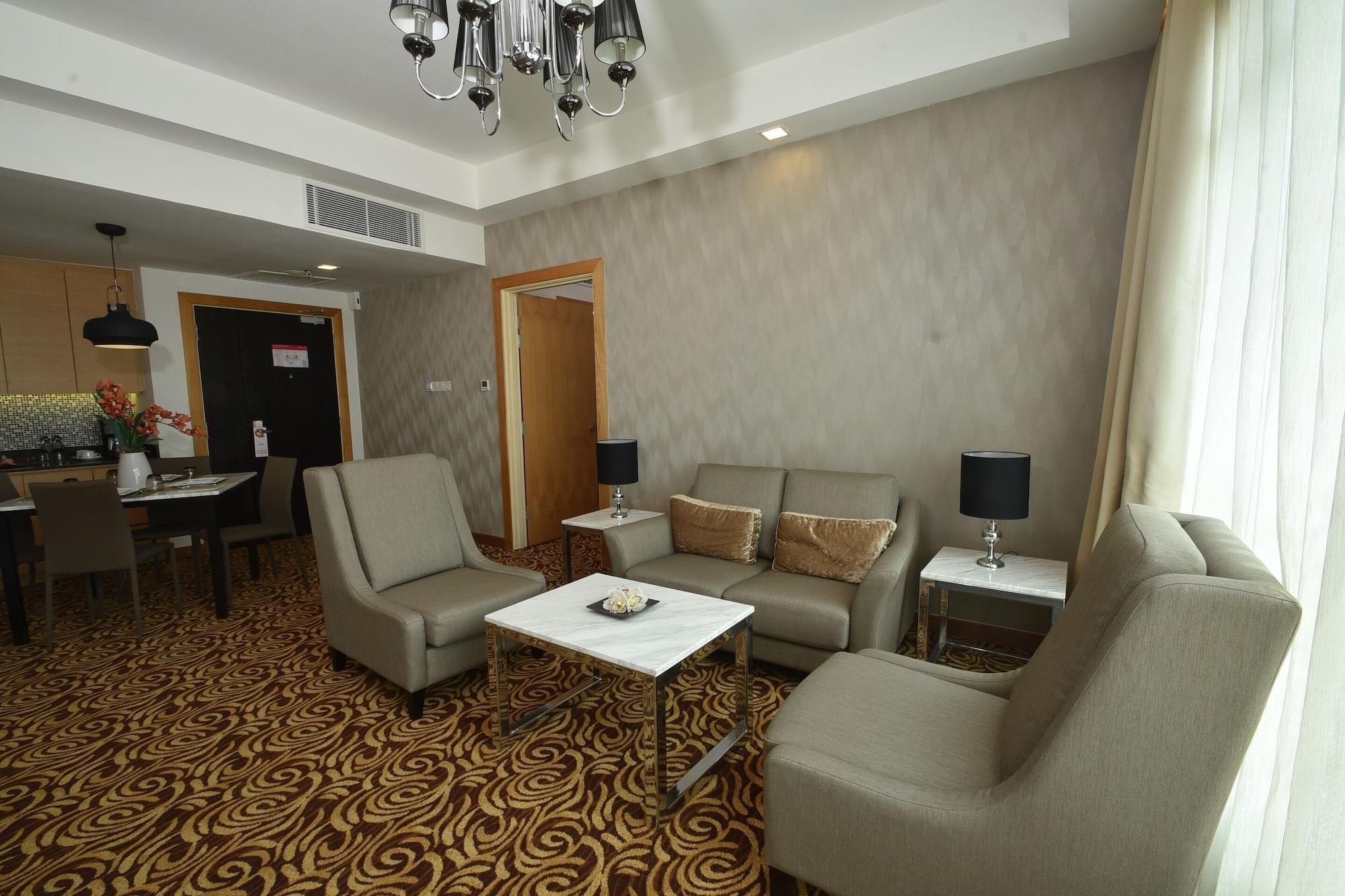 Tenera Hotel Bangi Extérieur photo A living room in a suite at the hotel
